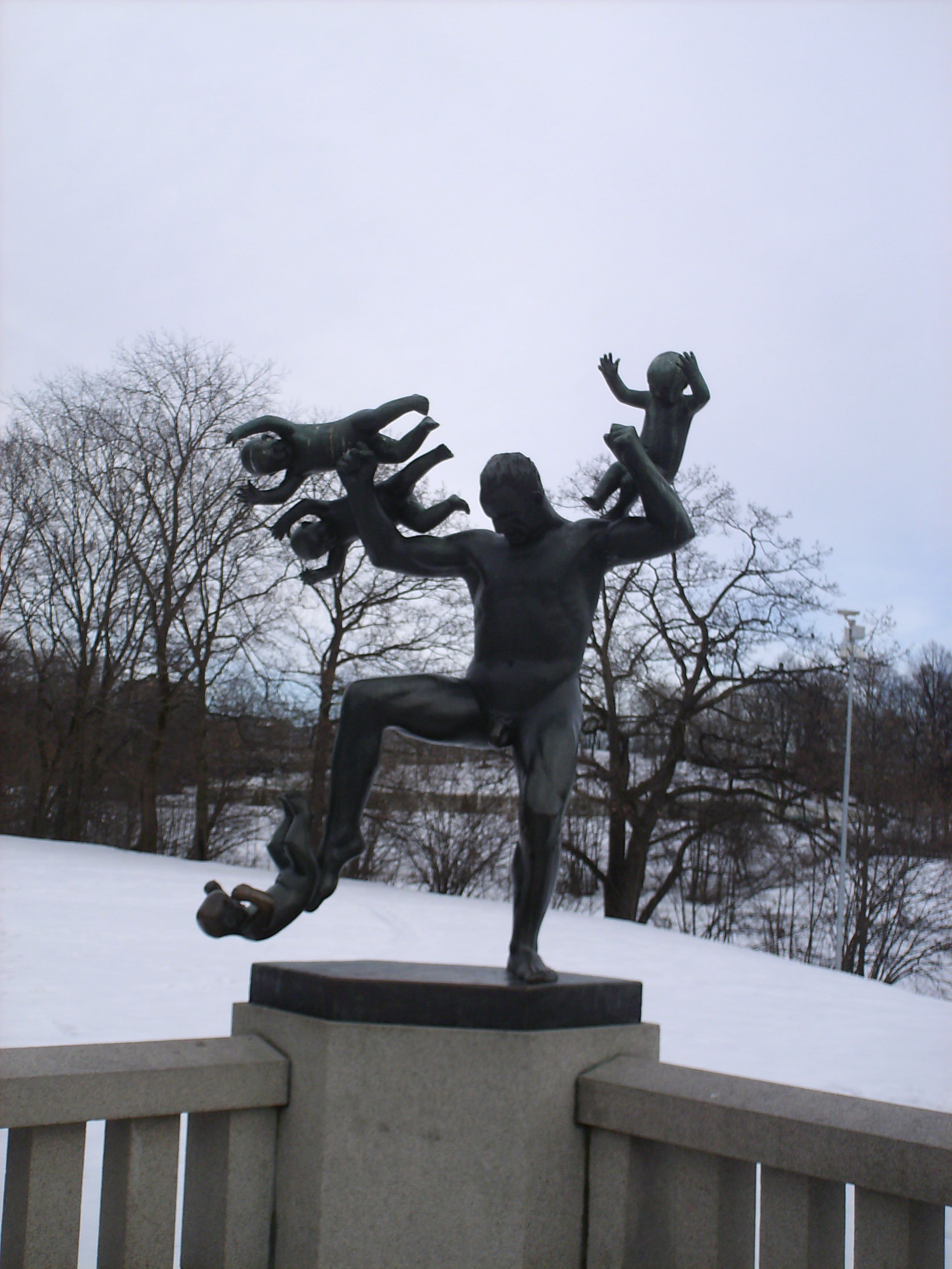 Sculpture of a man attacked by angry babies